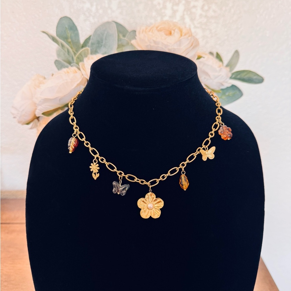 Charming Gold Necklace with Floral and Butterfly Accents - Picture 5 of 5